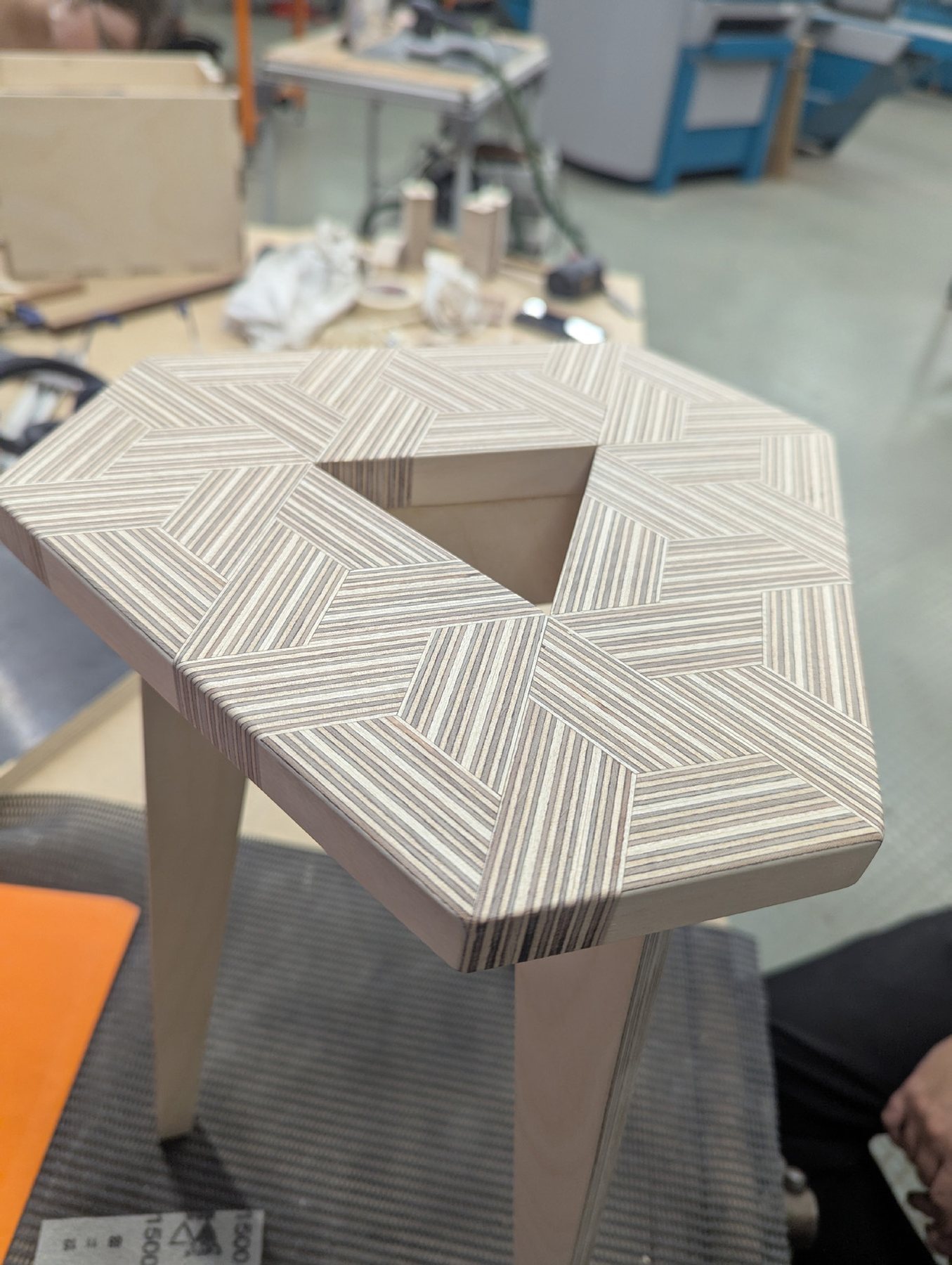 Close view of the finished seat pattern and leg joinery